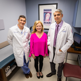 Group photo of patient and doctors